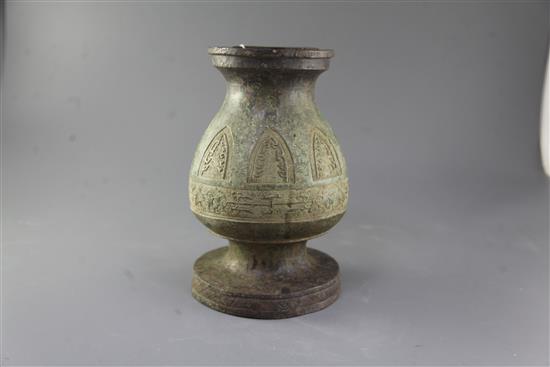 A Chinese archaic bronze ritual vessel, Eastern Zhou/Warring States, h. 28cm base panel lacking